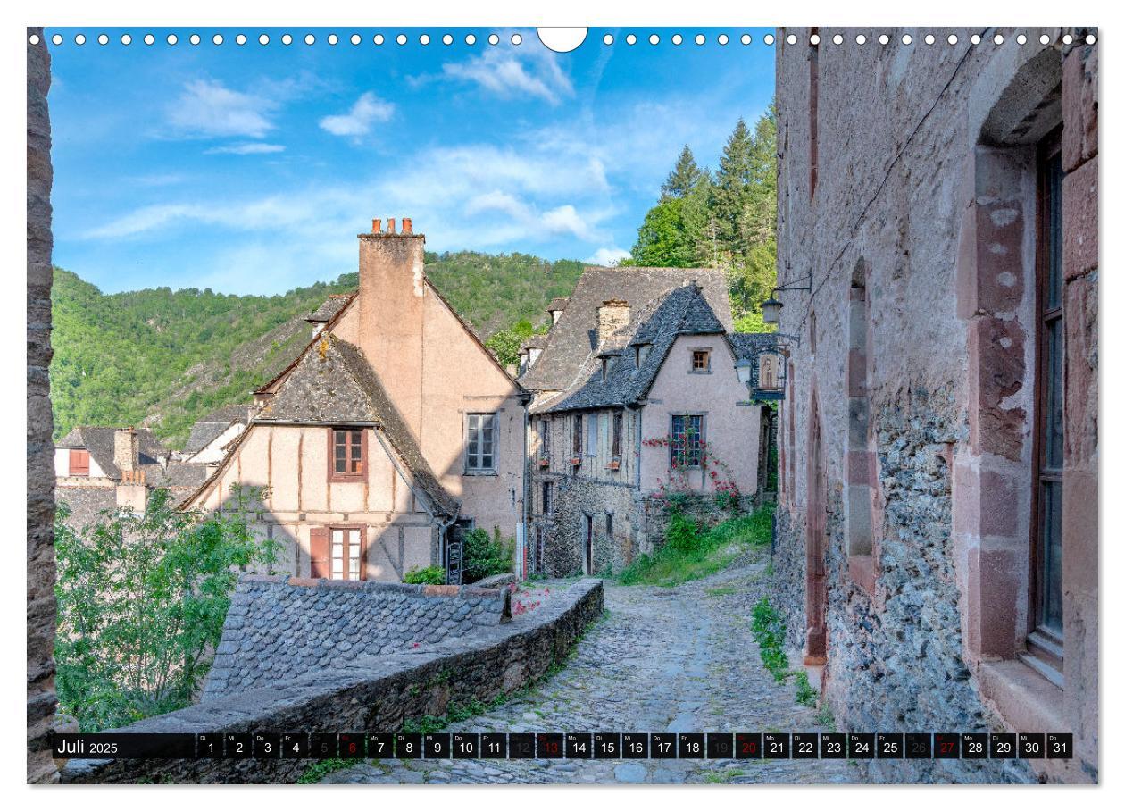 Bild: 9783383851810 | Conques ist eine wichtige Station am französischen Jakobsweg...